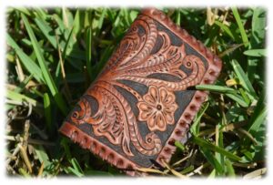 Porte monnaie en cuir végétal repoussé